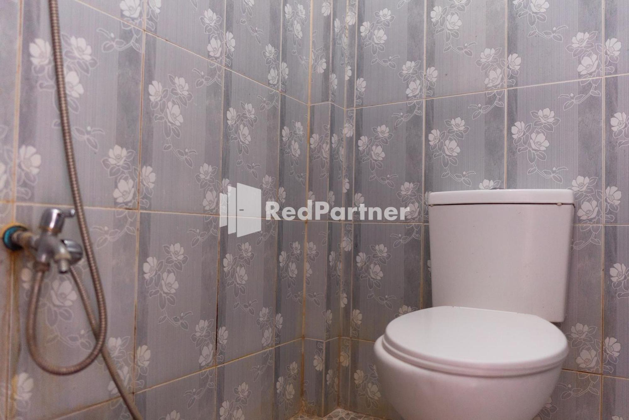 Pondok Kelapa Homestay Lampung Mitra Reddoorz باندار لامبونغ الغرفة الصورة