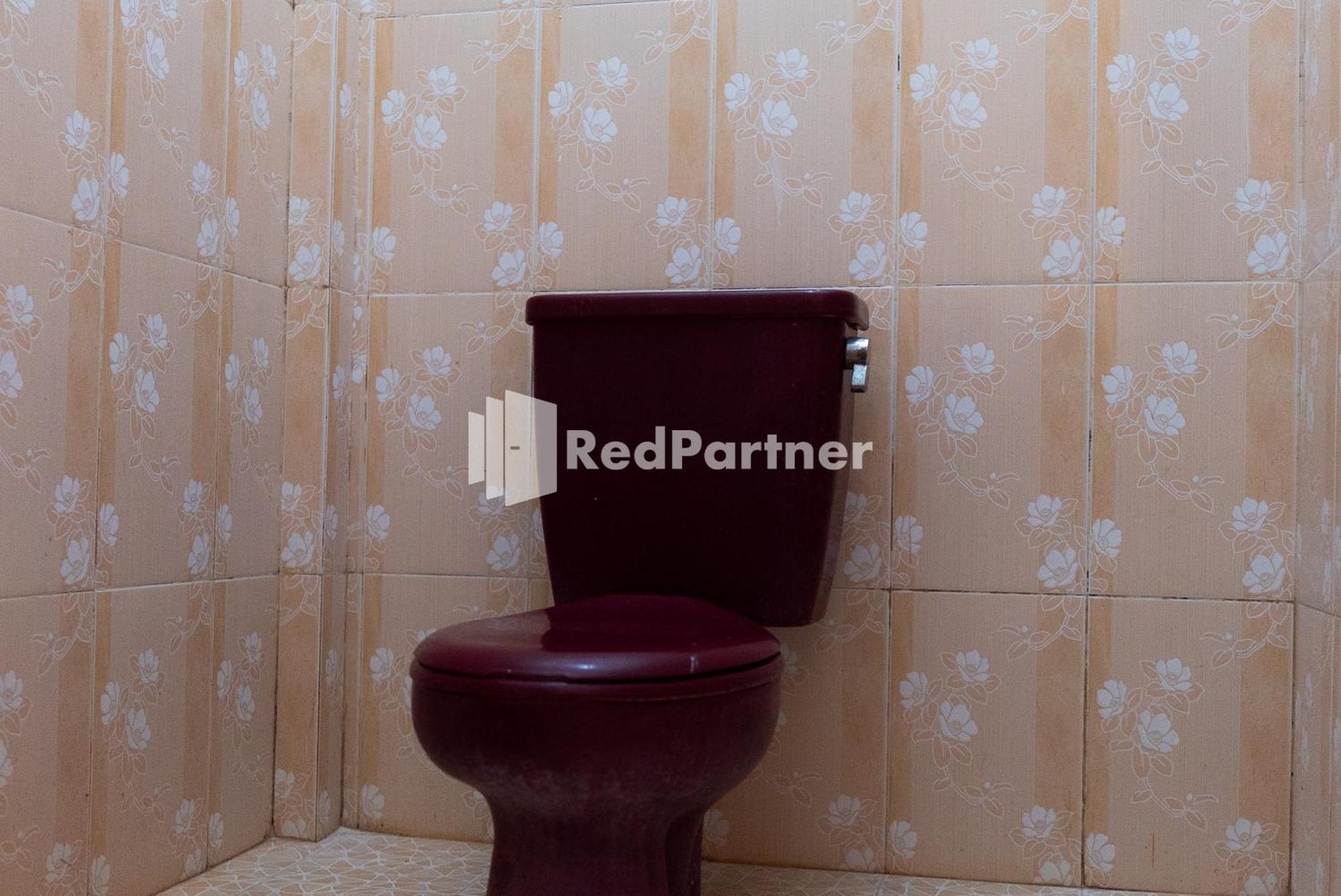 Pondok Kelapa Homestay Lampung Mitra Reddoorz باندار لامبونغ الغرفة الصورة